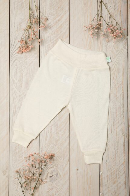 Kelnytės kūdikiui iš 100% merino vilnos, baltos spalvos