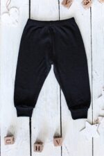 Kelnytės kūdikiui iš 100% merino vilnos, juodos spalvos, švelnios ir patogios kasdienai