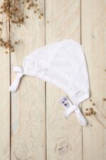 Balta lininė kepurytė kūdikiui